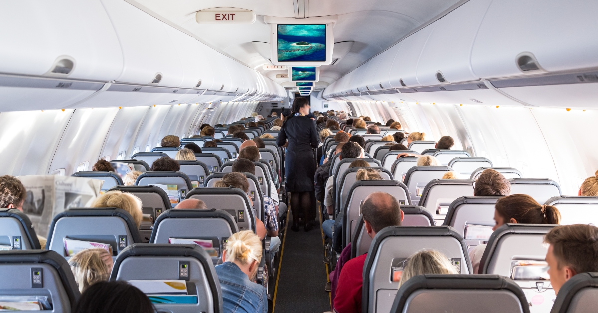 people on airplane during flight 