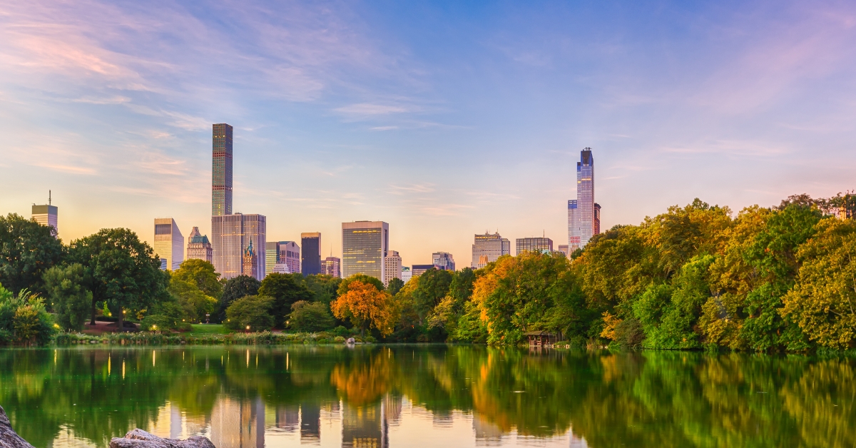 cityscape of central park south from the lagoon