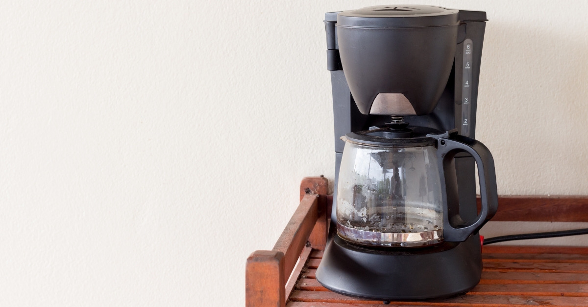coffee maker on wooden table