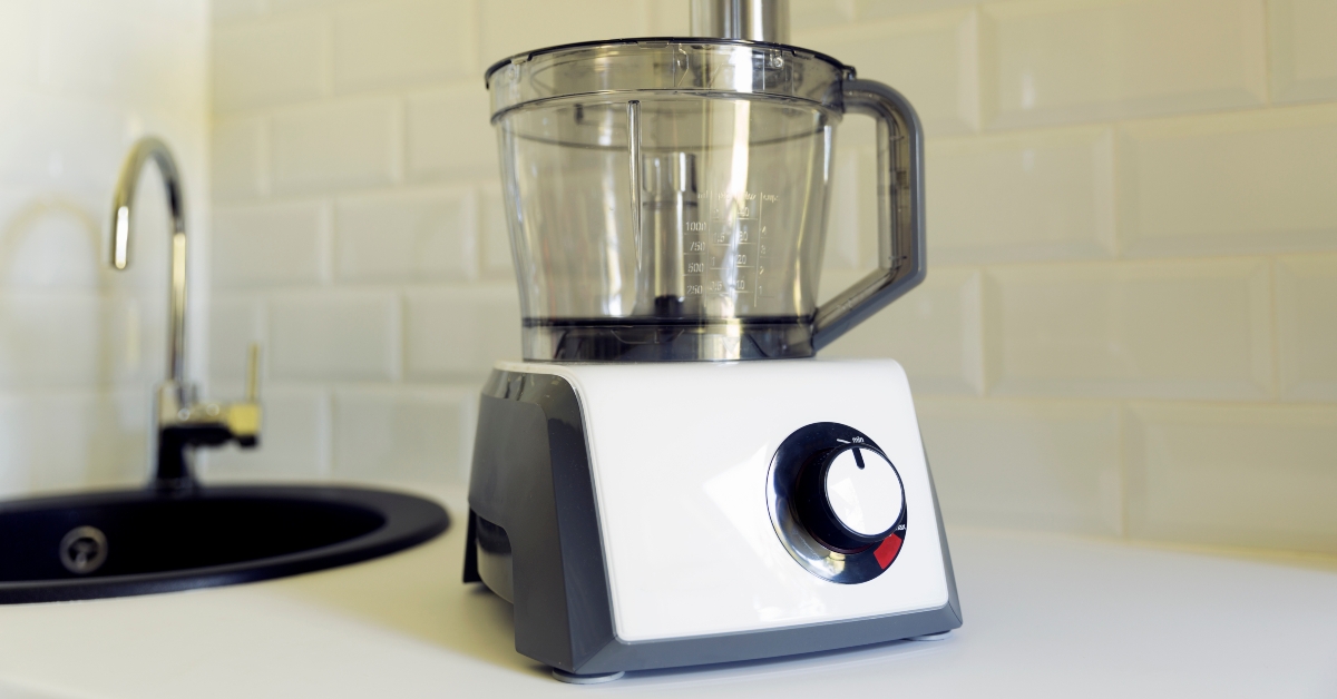 Electric food processor on kitchen countertop