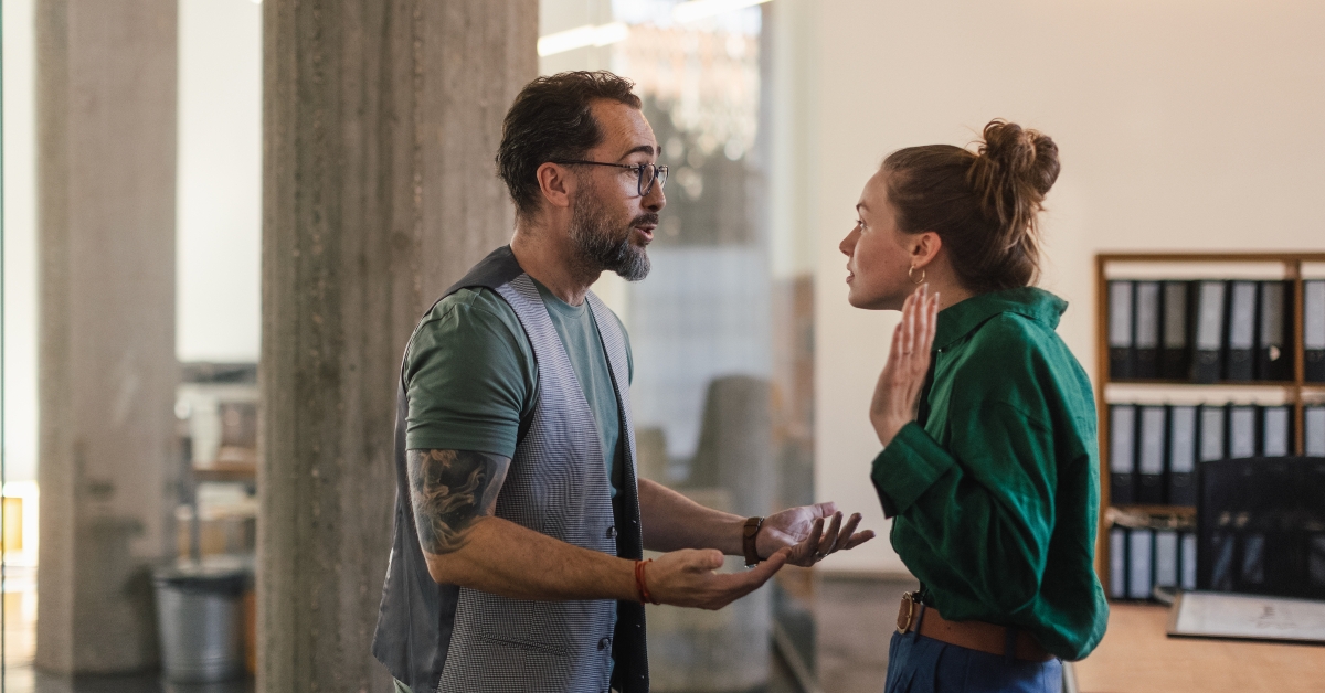 colleagues arguing in office