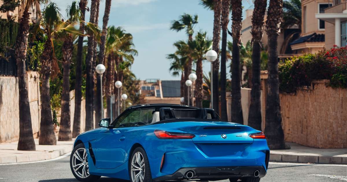 blue car at the city street