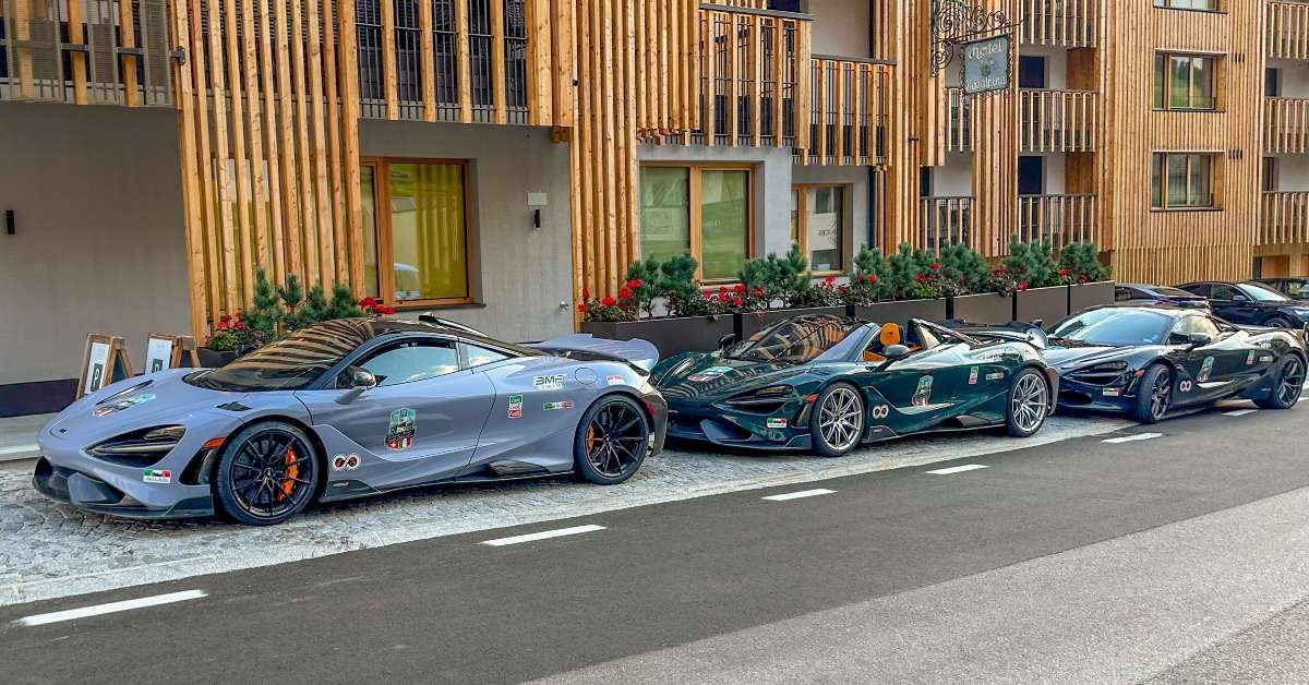 spider and coupe parked side by side