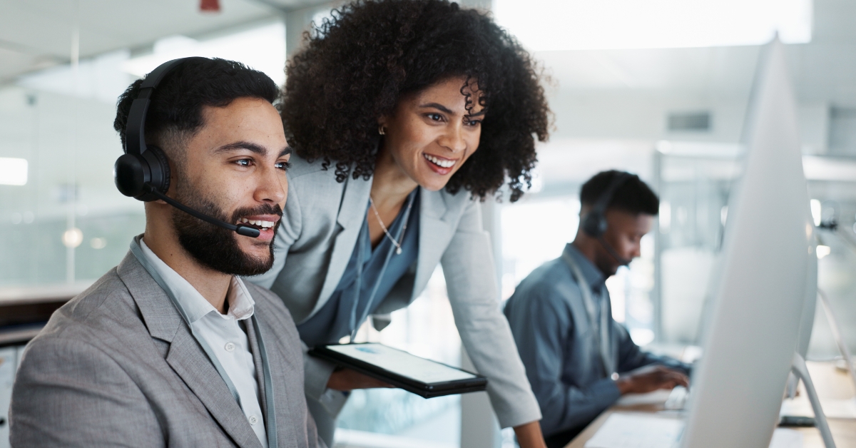 manager and people smile for telemarketing sales