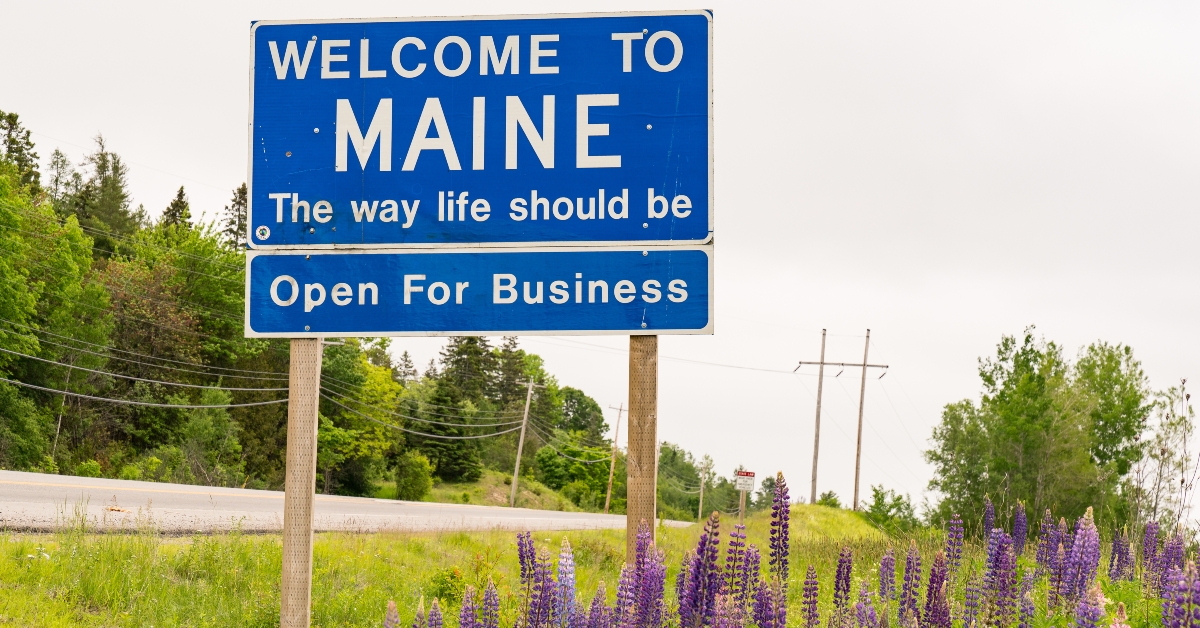 welcome to maine roadside sign