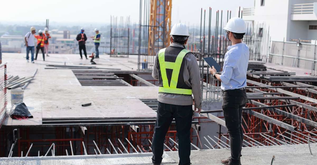 two engineers work on the construction site