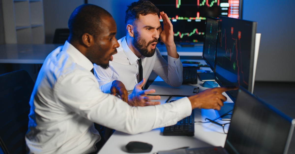 stressed businessman analyzing the stock market