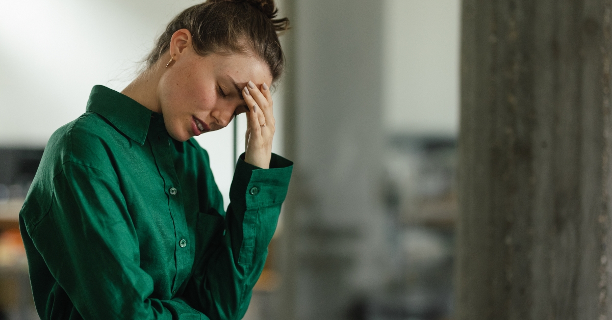 stressed woman in office having problem