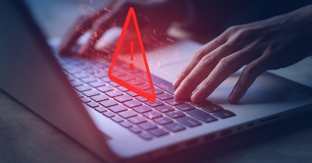 system hacked warning alert on laptop