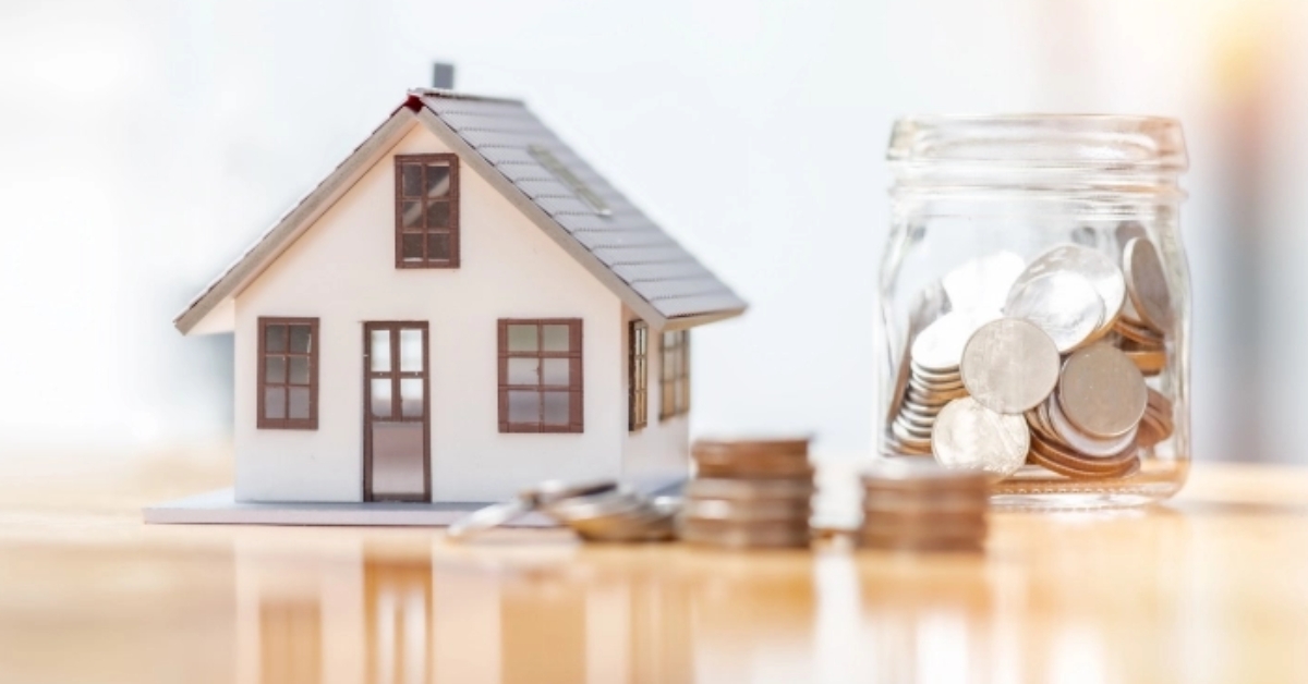 house model and coins