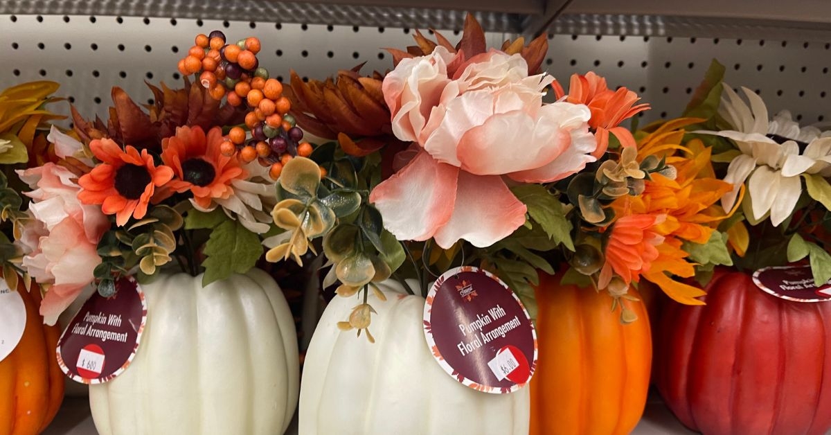 pumpkin with floral arrangement