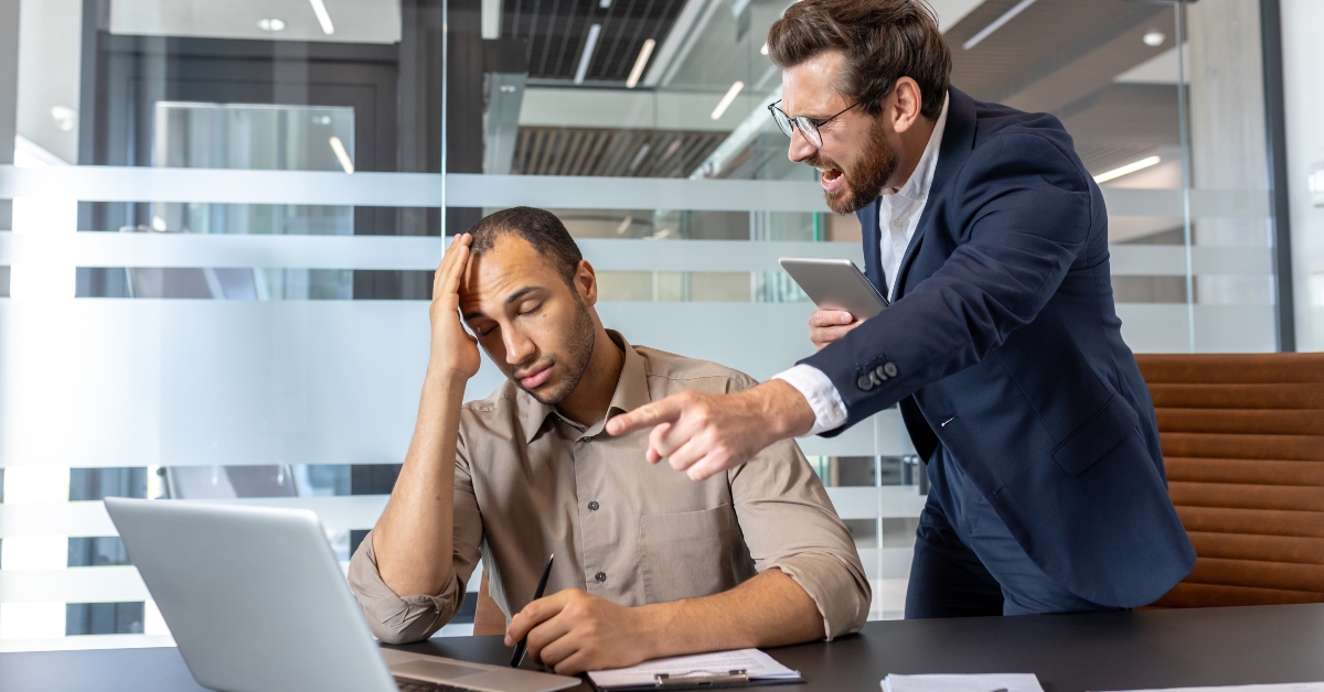 frustrated manager confronts a stressed employee