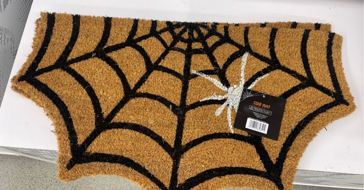 web themed coir mat