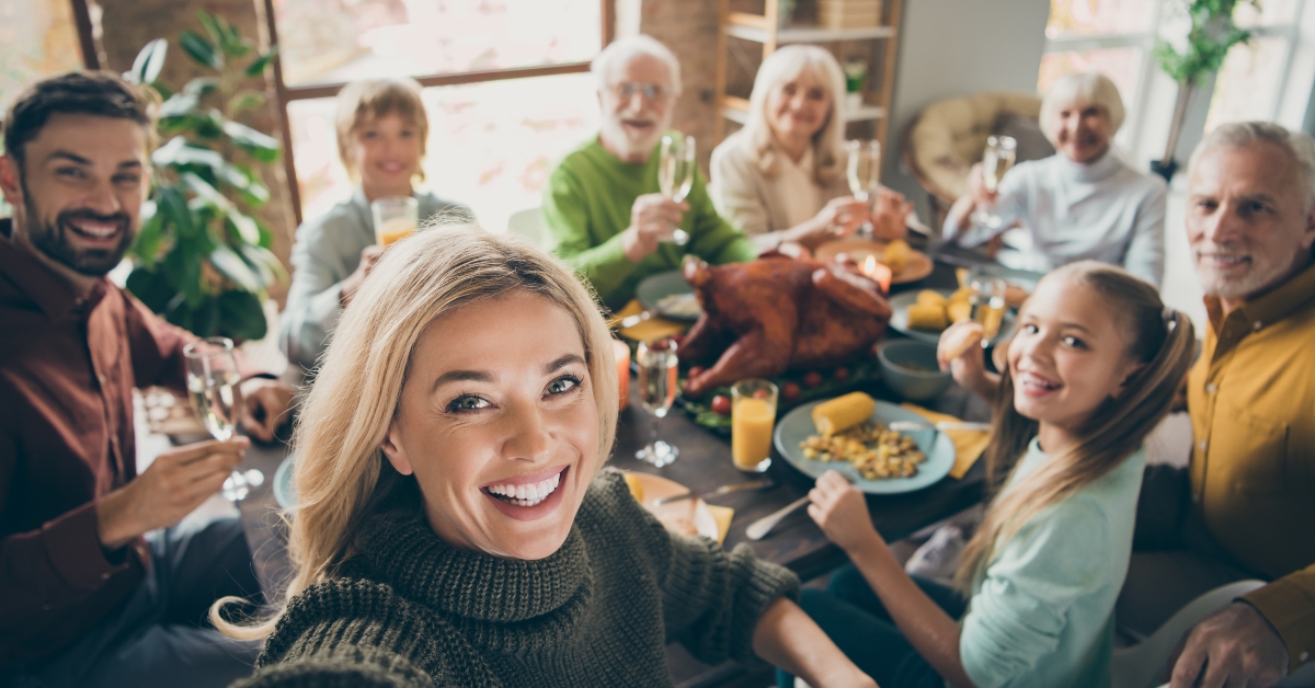 family feasts over roasted turkey