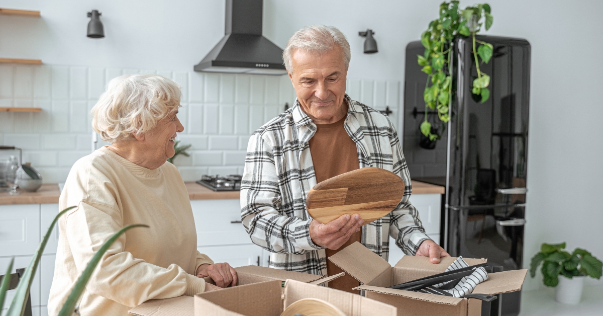 happy senior couple at their new house