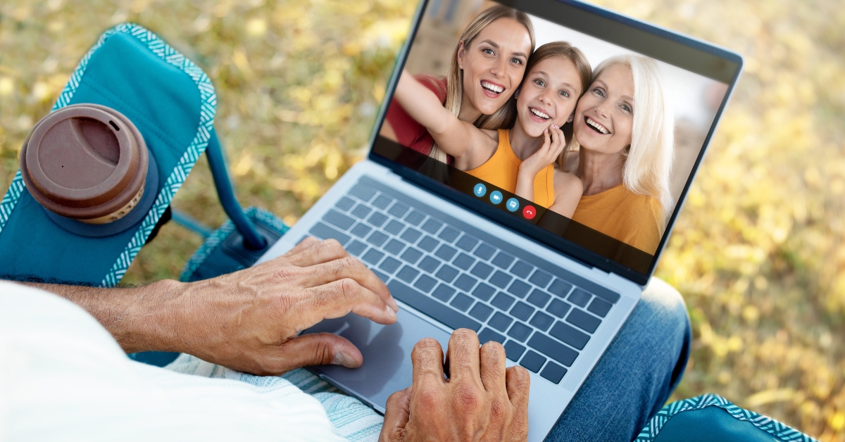 senior man have a video call with his family