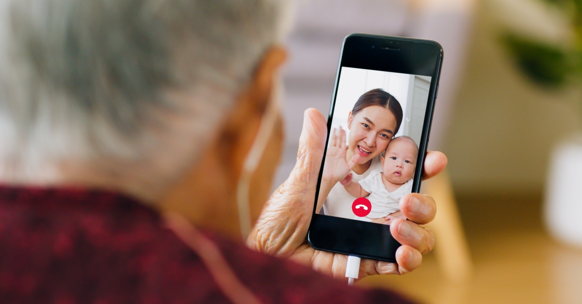 senior making video call