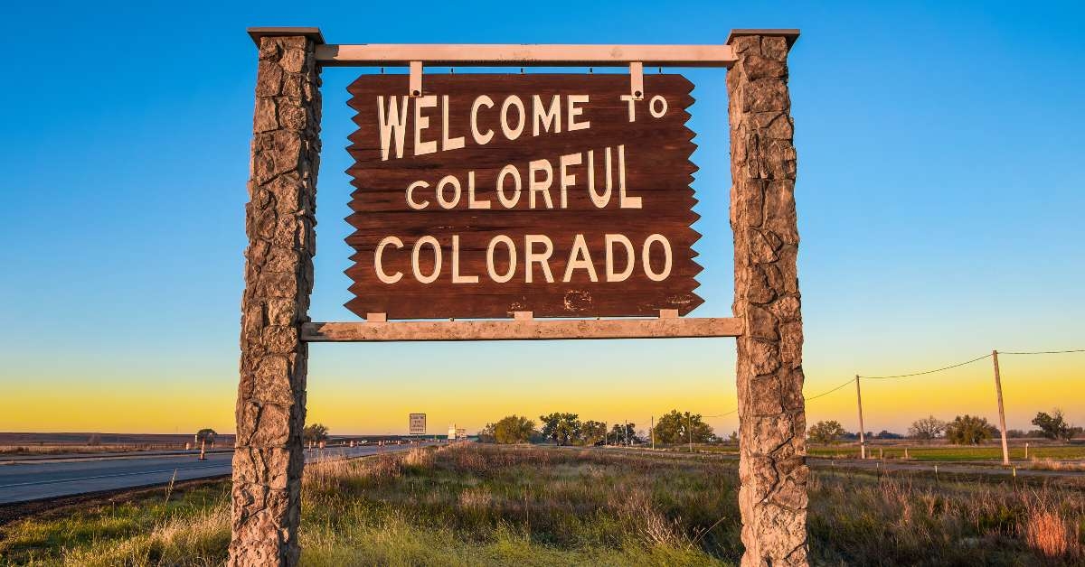 welcome to colorful colorado street sign 
