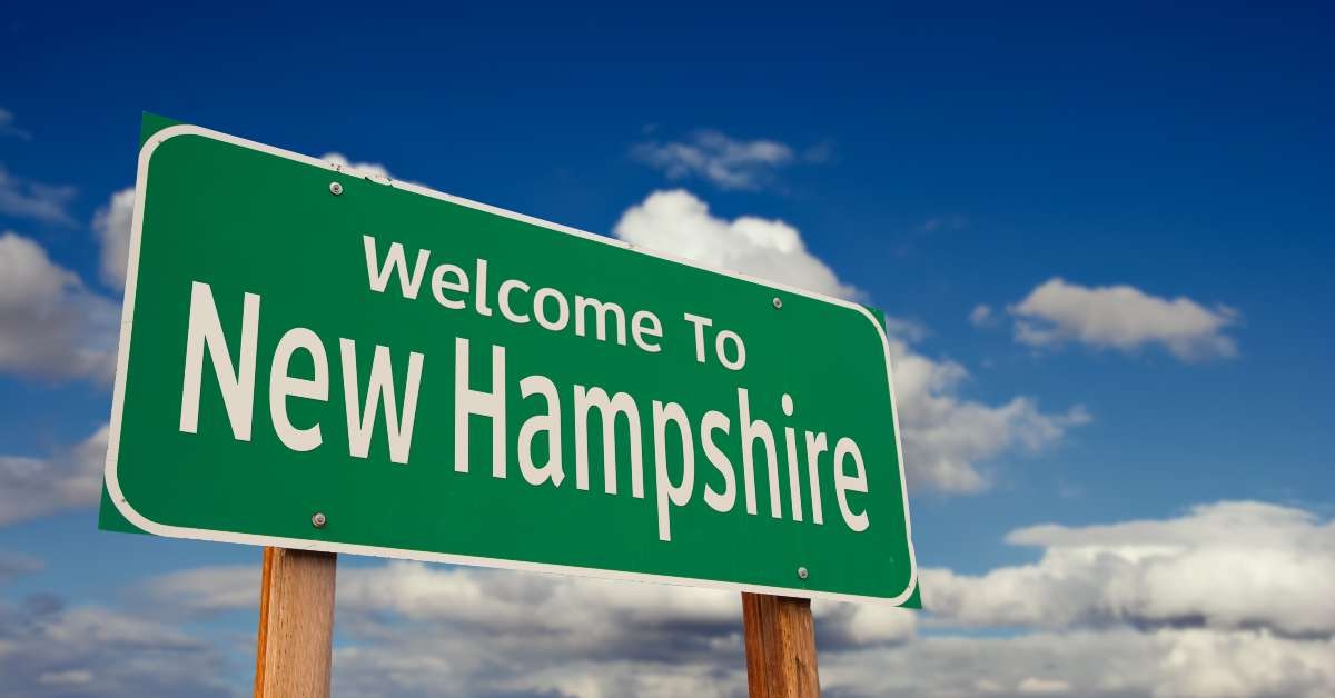 welcome to new hampshire green road sign