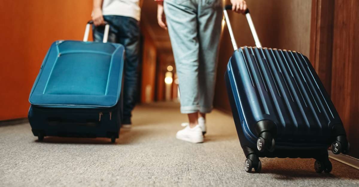 couple with suitcase 