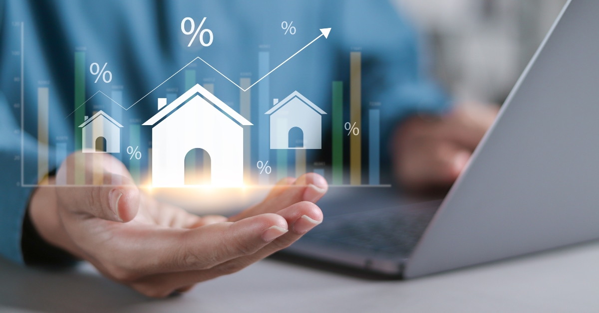 Person holding House icon for analyzing mortgage loan