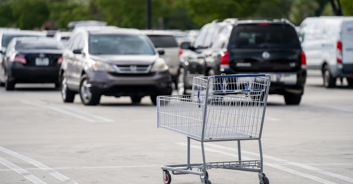 empty shopping cart in parking lot 