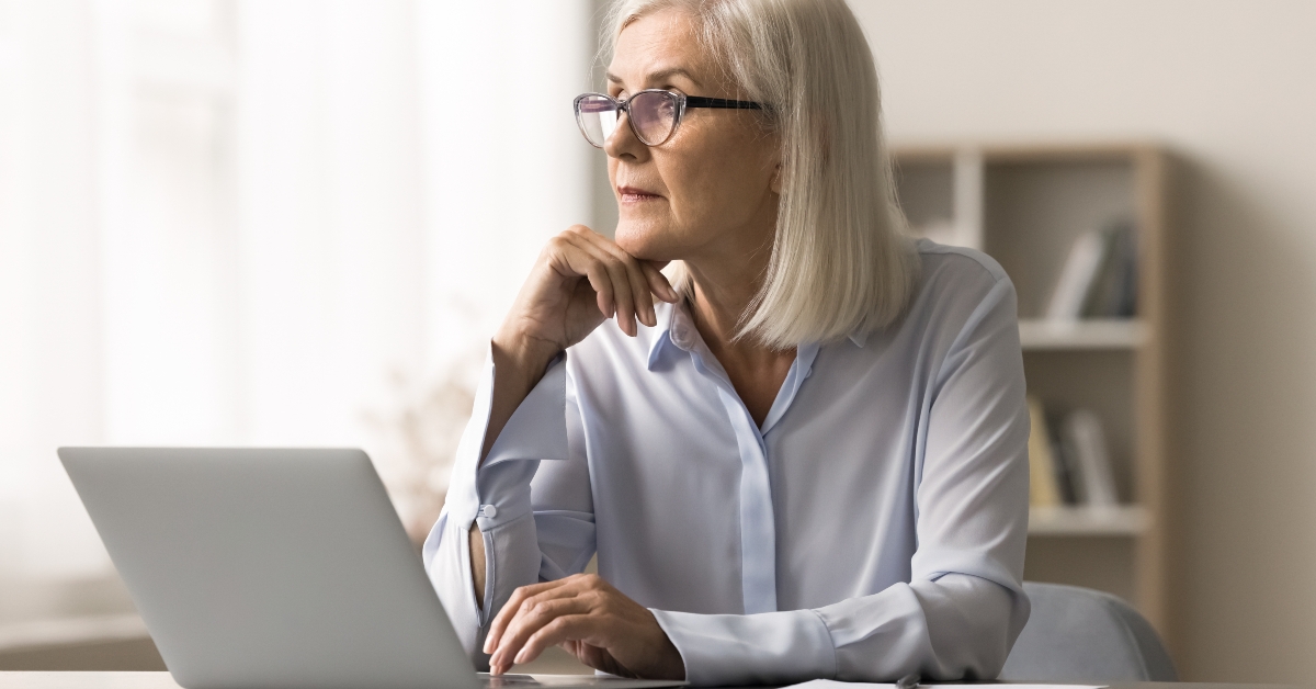 thoughtful middle-aged businesswoman