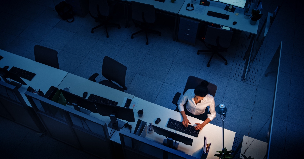 businesswoman working at night using computer