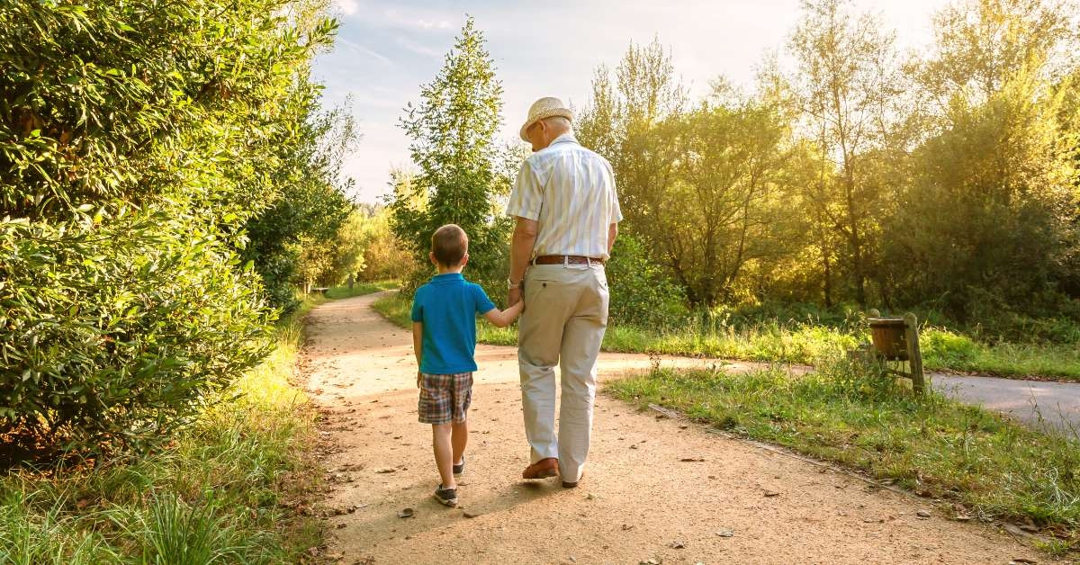 grandfather with hat and grandchild