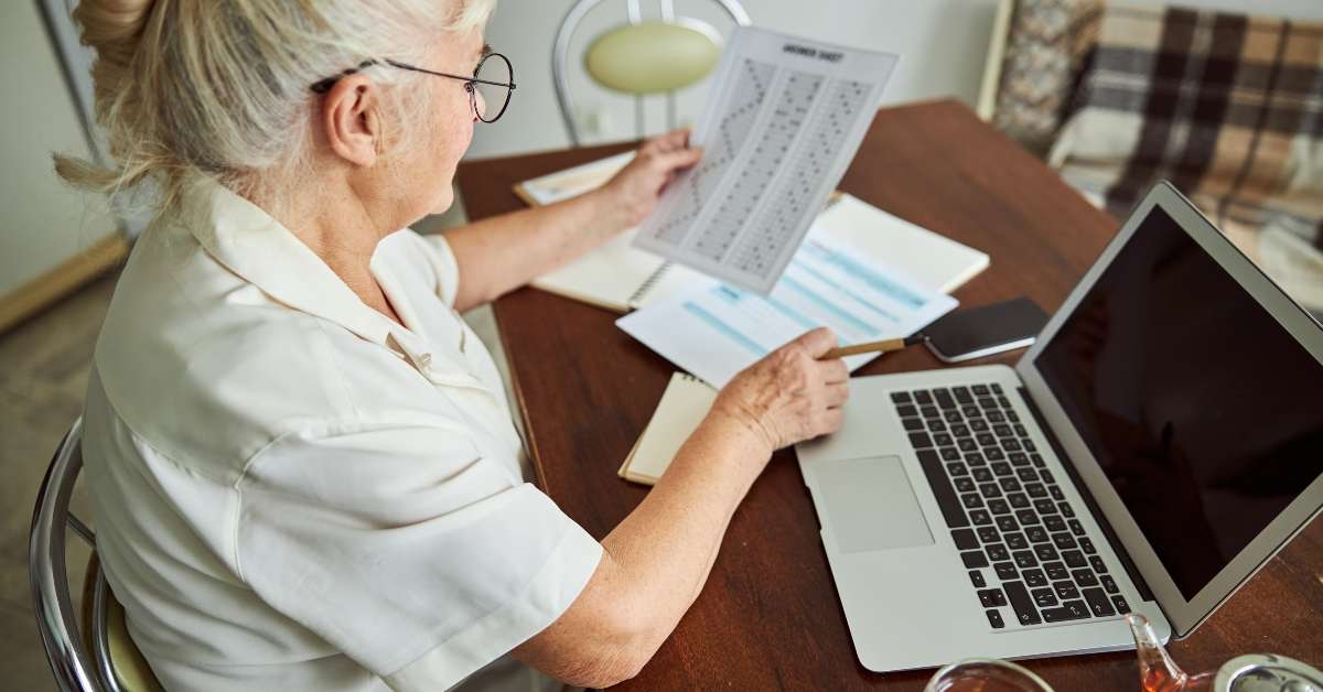 woman using notebook and doing test 