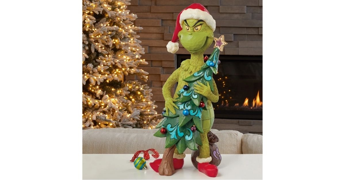holdiay grinch stealing tree statue
