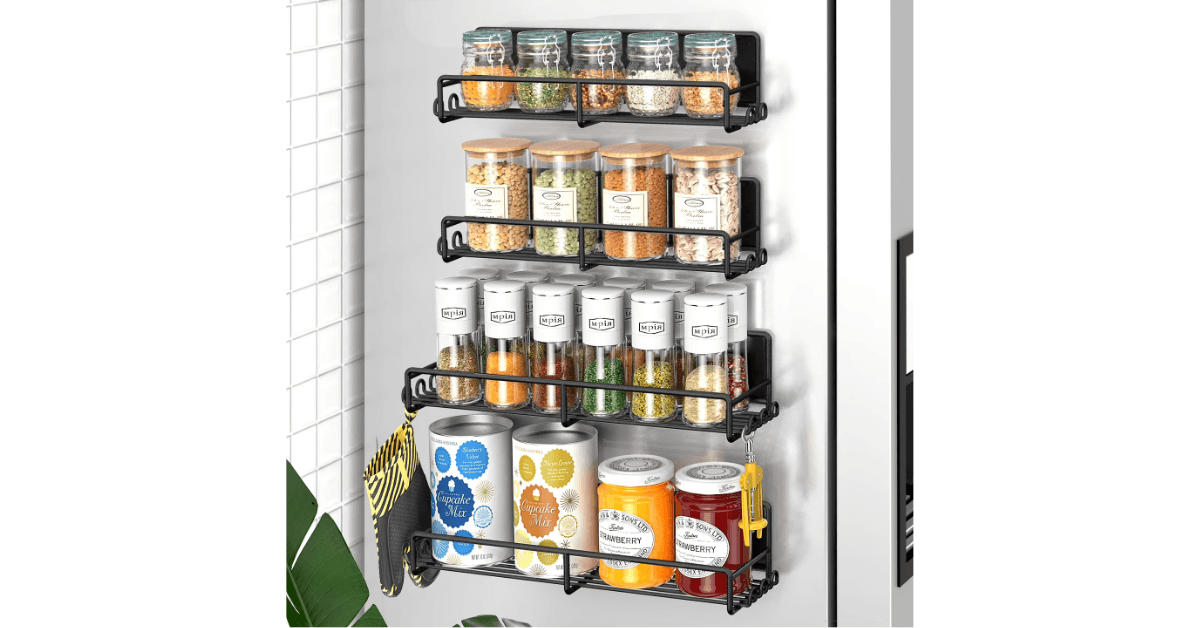 Four magnetic spice racks on refrigerator