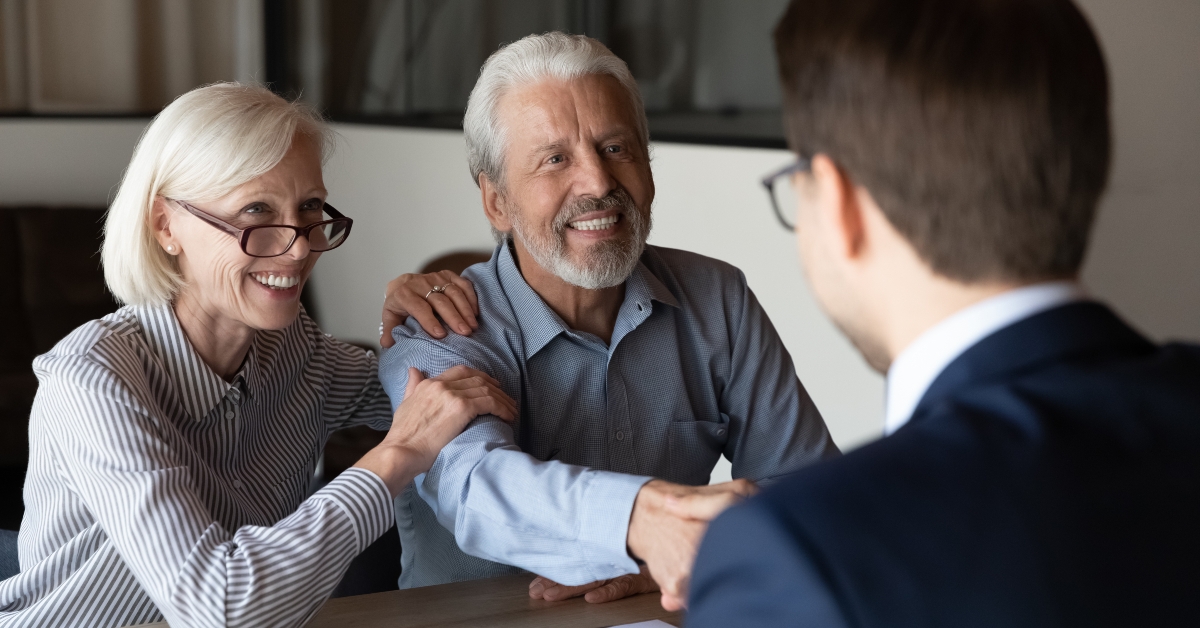 clients shake hand greeting