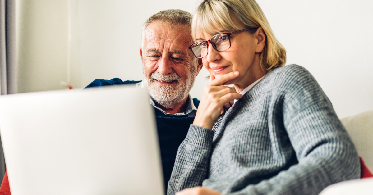 senior couple reading documents
