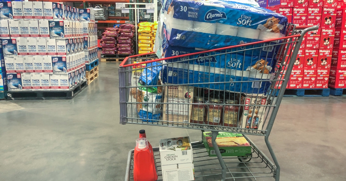 grocery cart with toliet paper and supplies