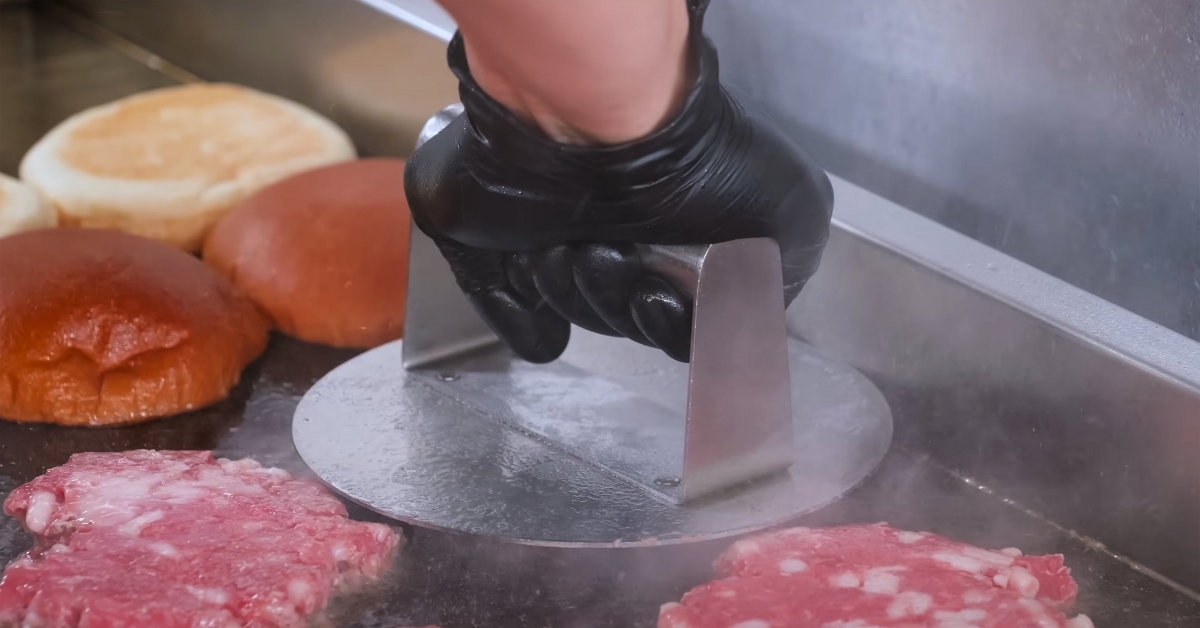 pressing ground beef patties