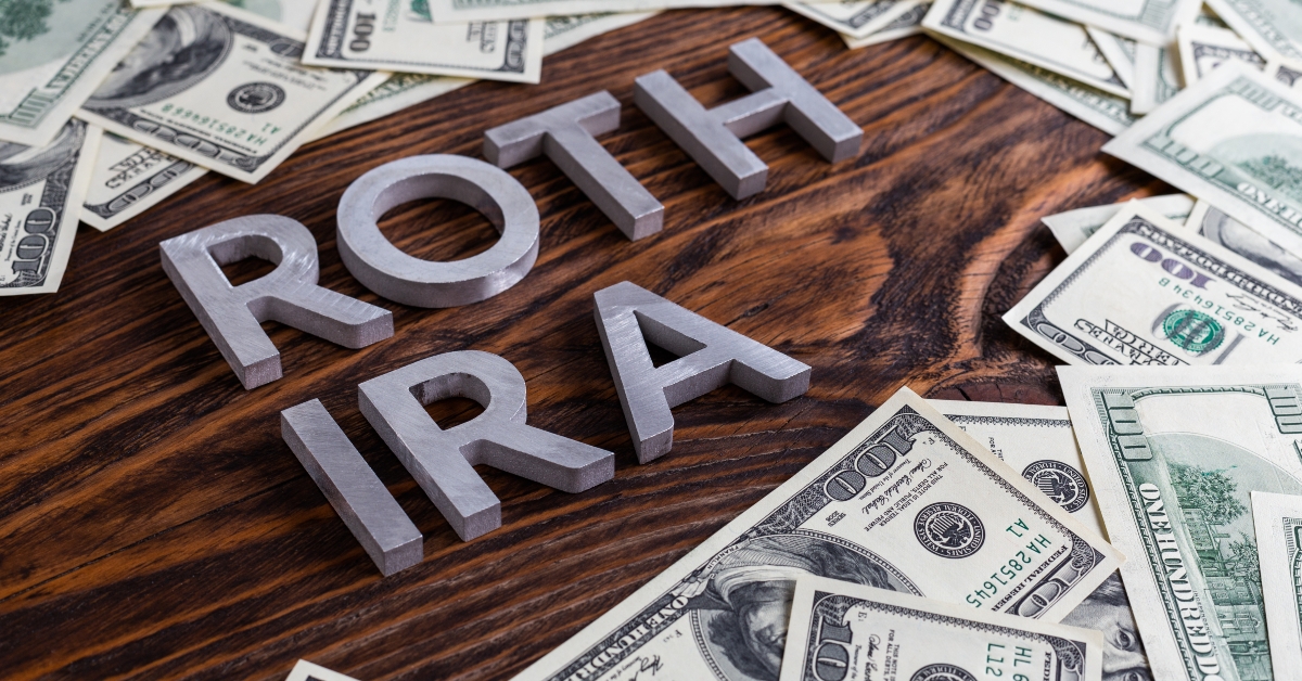 words roth ira with us dollar banknotes