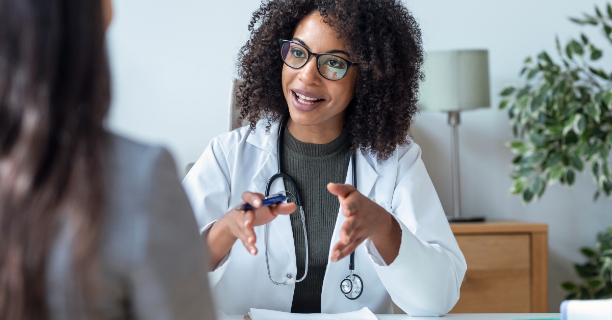 female doctor explaining medical treatment to patient