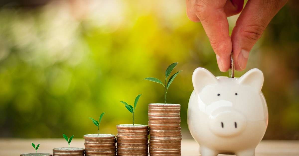 putting coins in a piggy bank