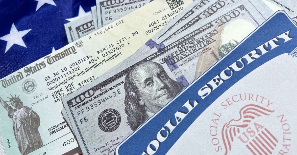 social security card us treasury check and currency bills