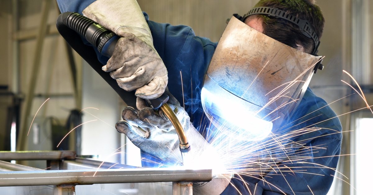 welder works in metal construction
