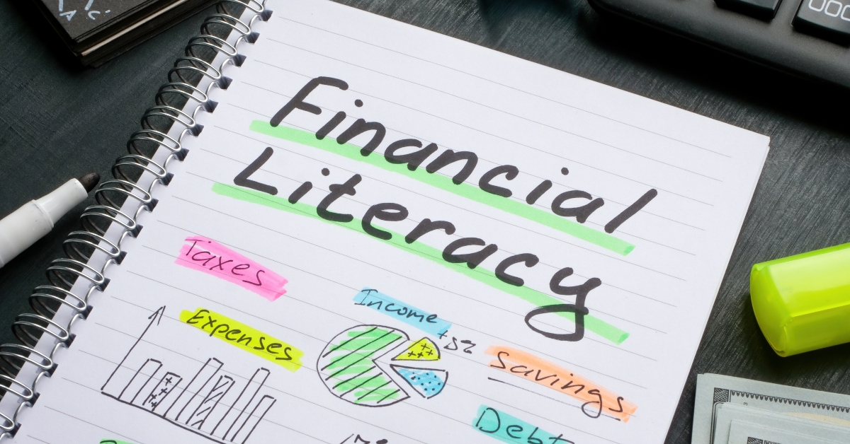 notebook with marks about financial literacy