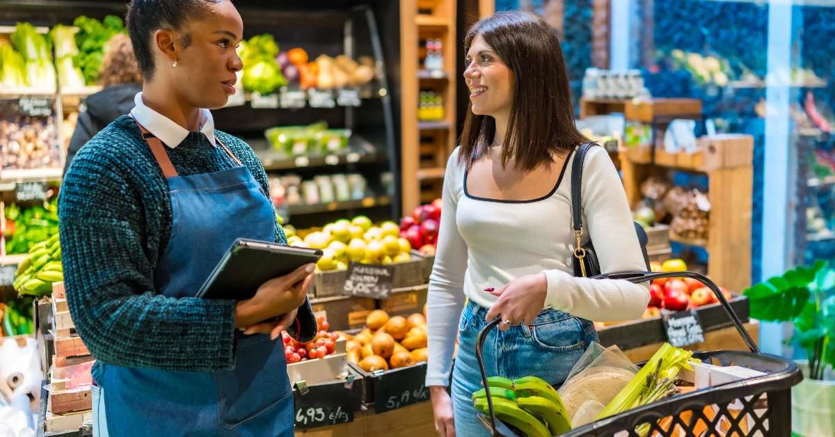 saleswoman assisting customer