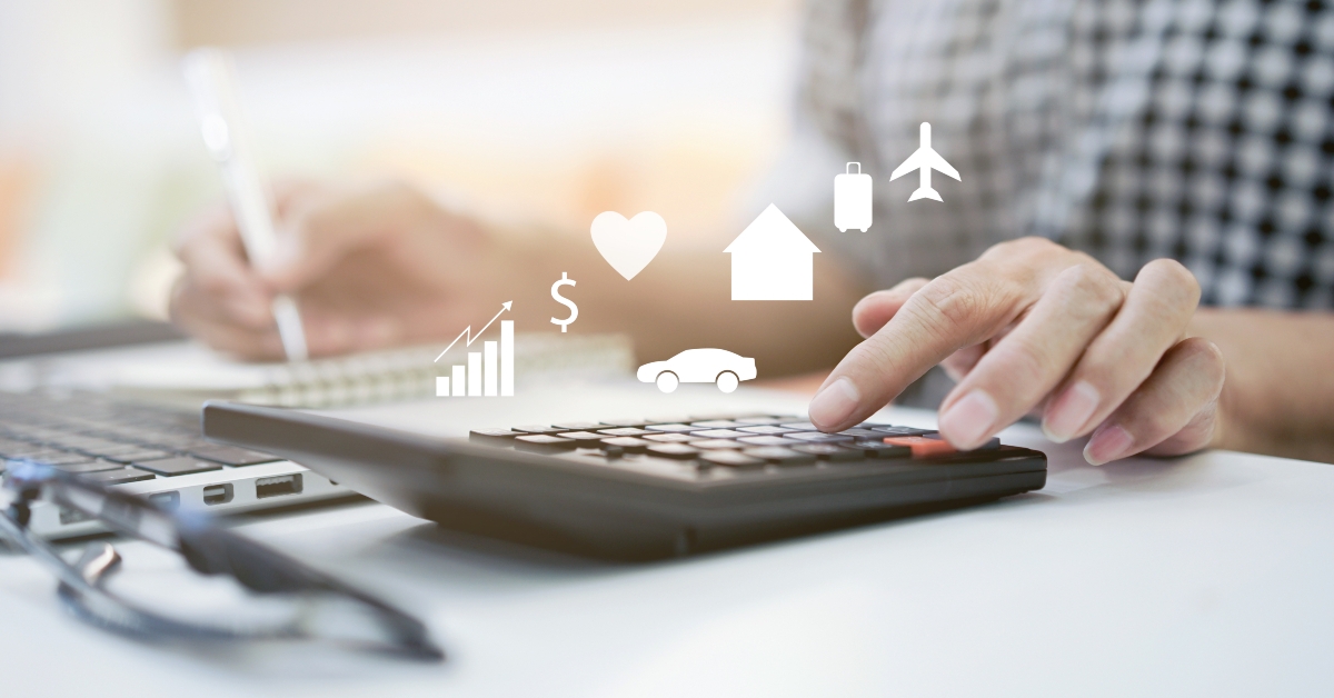 woman calculating monthly expenses