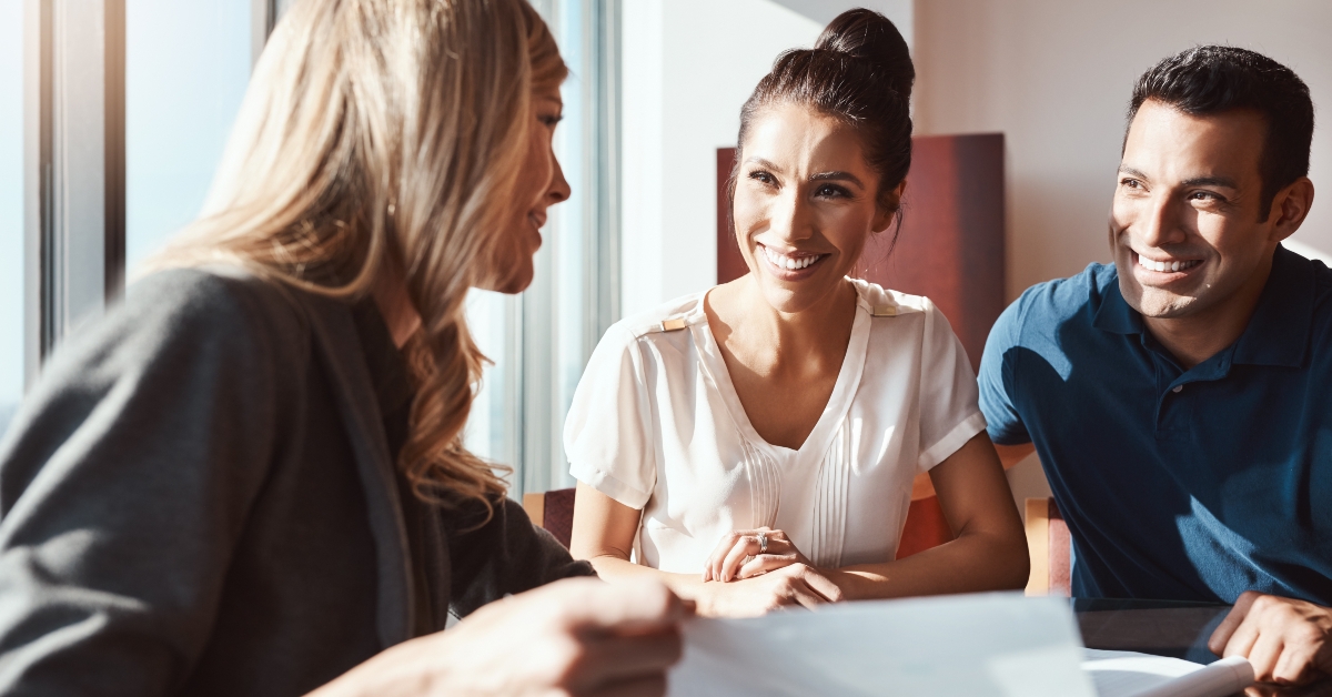 couple consulting to financial advisor