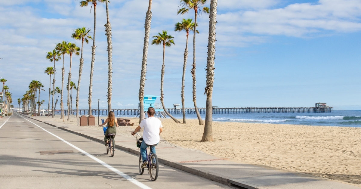 people riding bikes at beach