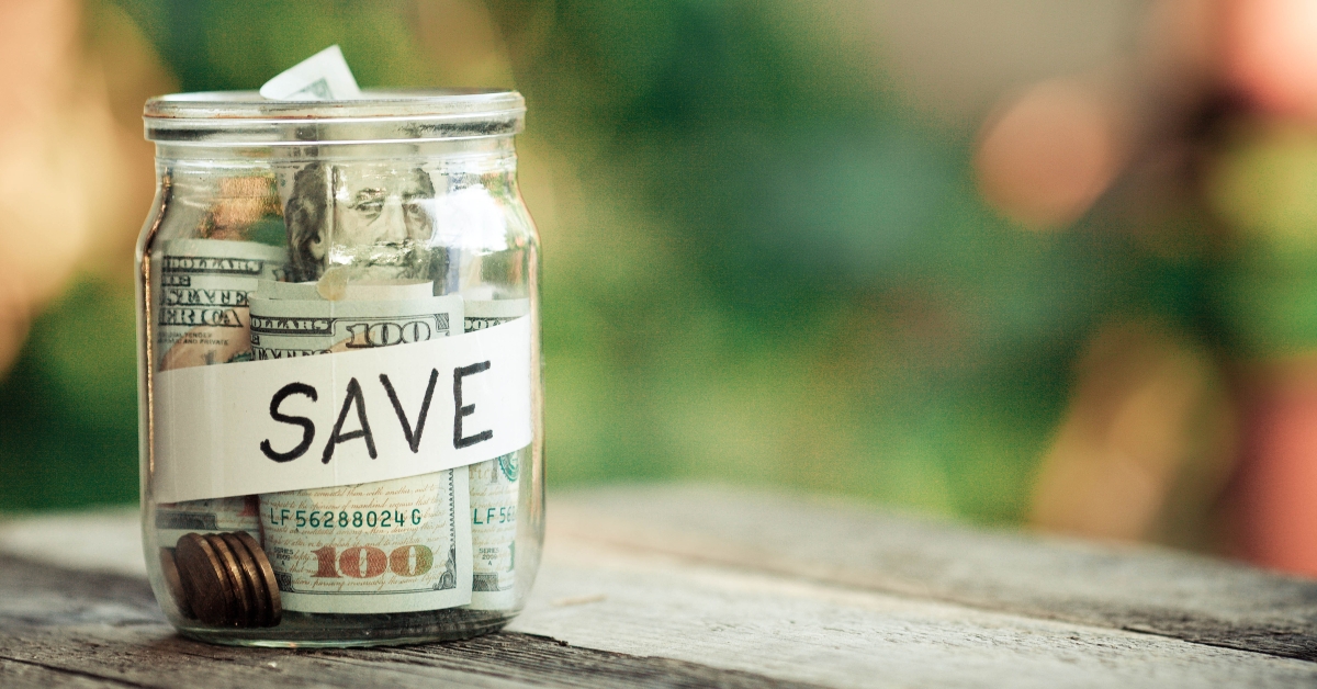 glass jars with dollars 