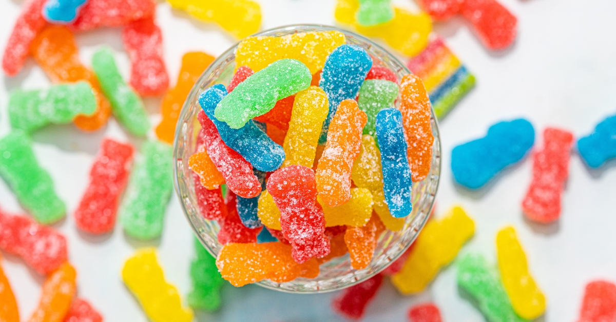 Sour gummy candy on a glass