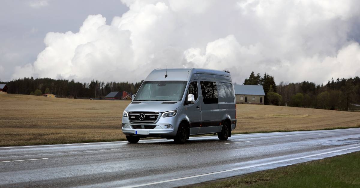 Silver Mercedes-Benz Sprinter 3 van on highway