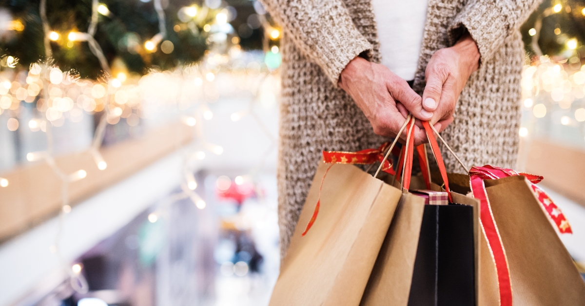 woman with bags doing Christmas shopping
